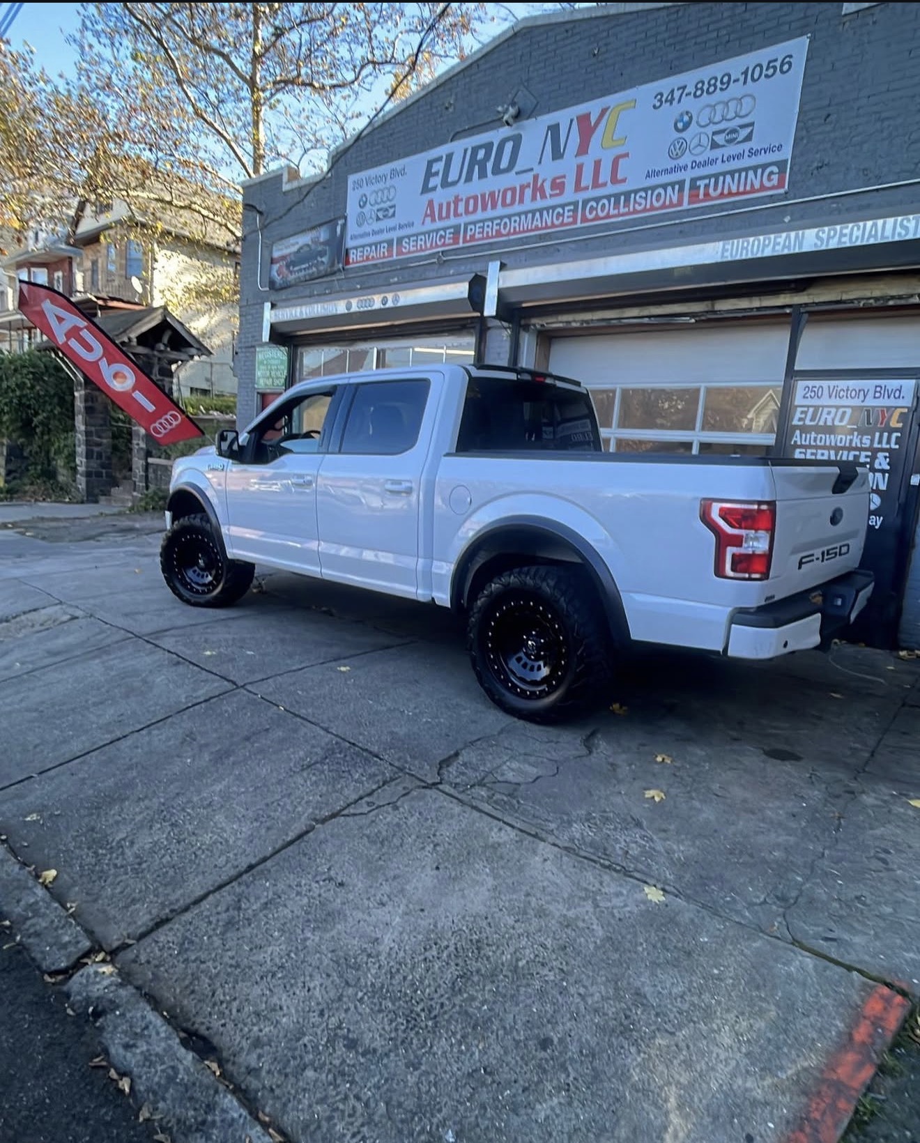 Euro NYC Autoworks storefront with truck in front
